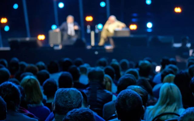 Crowd listening to a lecture